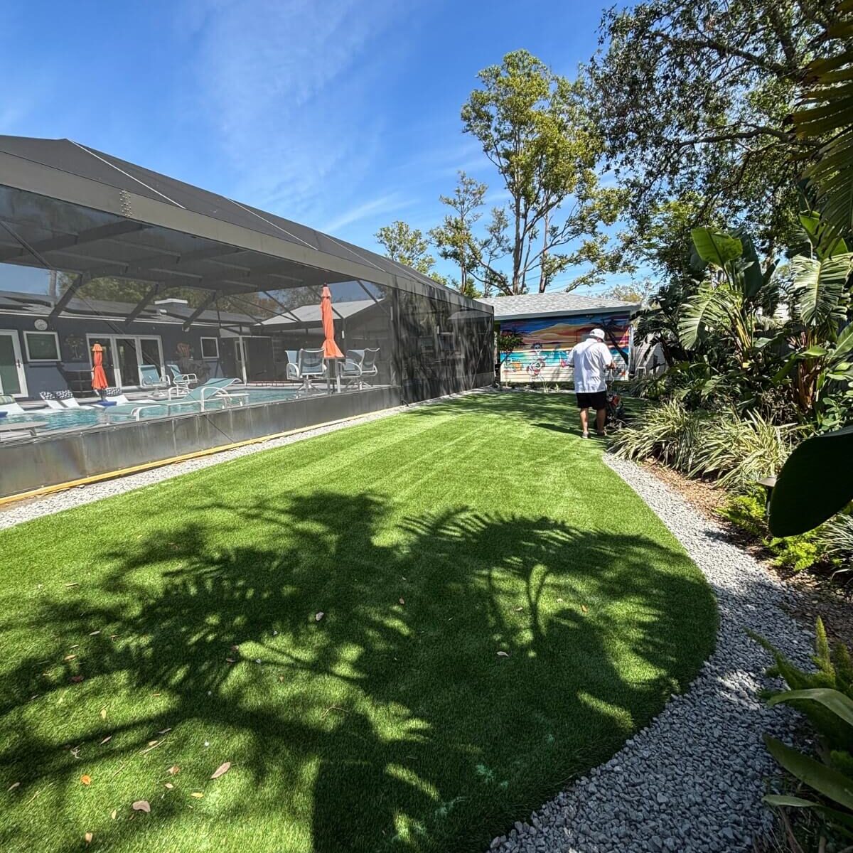 artificial turf backyard with garden beds