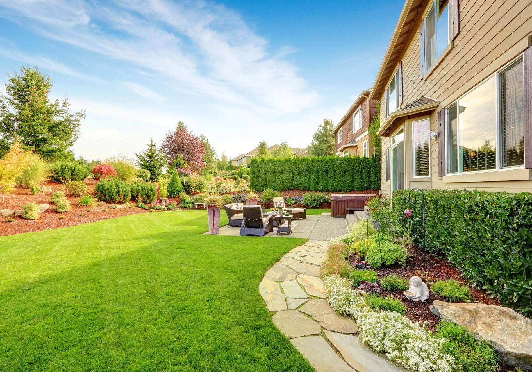 Luxury house exterior with impressive backyard landscape design